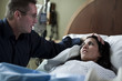 USA, Utah, Payson, Man assisting childbirth in hospital