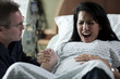 USA, Utah, Payson, Man assisting childbirth in hospital
