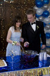 USA, Utah, Cedar Hills, Young couple pouring drinks at birthday party