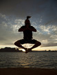 "USA, Utah, Young man jumping by Lake Powell"