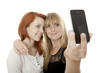 young beautiful red and blond haired girls doing a self portrait