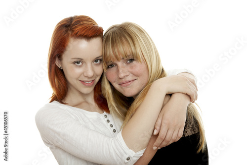 Photo: young beautiful red and blond haired girls are best friends young beautiful red and blond haired girls are best friends