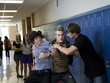 "USA, Utah, Spanish Fork, Three boys (16-17) fighting in school corridor"