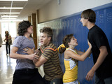 Photo: "USA, Utah, Spanish Fork, Four school children (16-17) fighting in school corridor" "USA, Utah, Spanish Fork, Four school children (16-17) fighting in school corridor"