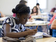 Photo: "USA, Utah, Spanish Fork, School girl (14-15) working in classroom" "USA, Utah, Spanish Fork, School girl (14-15) working in classroom"