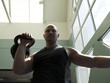 "USA, Utah, Draper, Man exercising in gym"