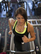 "USA, Utah, Draper, Woman exercising on treadmill"