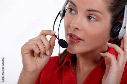 Photo: Female call-center worker Female call-center worker