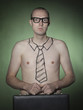 "Portrait of young businessman with tie tattoo, holding briefcase"