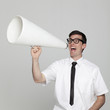 Studio portrait of young man with megaphone