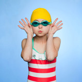 Photo: "Studio portrait of girl (10-11) wearing swimsuit, swimming cap and swimming goggles" "Studio portrait of girl (10-11) wearing swimsuit, swimming cap and swimming goggles"