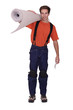 Man carrying roll of carpet over shoulder