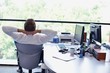 happy young business man at office