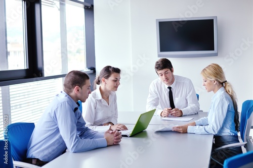 Photo: business people in a meeting at office business people in a meeting at office