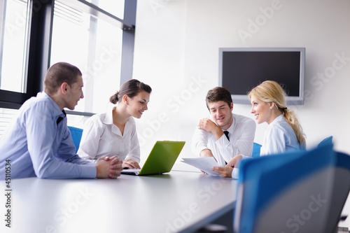 Photo: business people in a meeting at office business people in a meeting at office