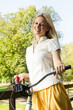 happy young woman on the bicycle
