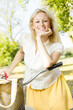 happy young woman on the bicycle