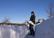 Man with a snow shovel