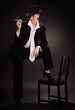 Foto: Adult woman smoking cigarette in bar Adult woman smoking cigarette in bar