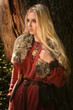 Foto: Scandinavian girl with runic signs Scandinavian girl with runic signs