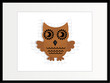 brown wooden owl in frame