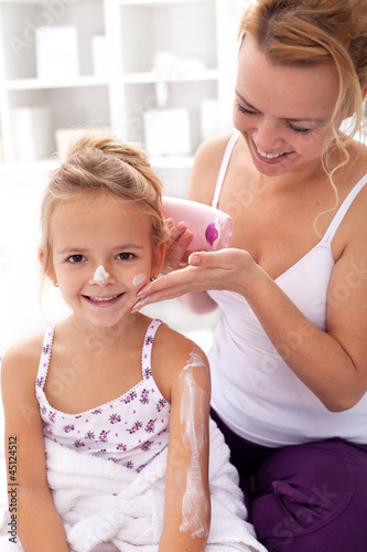 Photo: Beauty ritual - little girl after bath Beauty ritual - little girl after bath