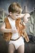 little boy pretending to be cowboy