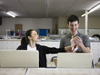 man and woman at a laundromat