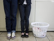 man and woman at a laundromat
