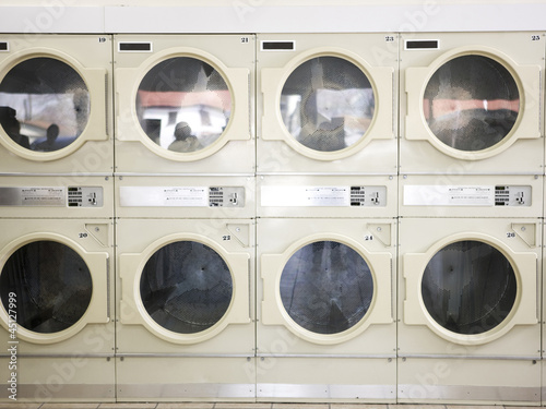 Photo: dryers in a laundromat dryers in a laundromat