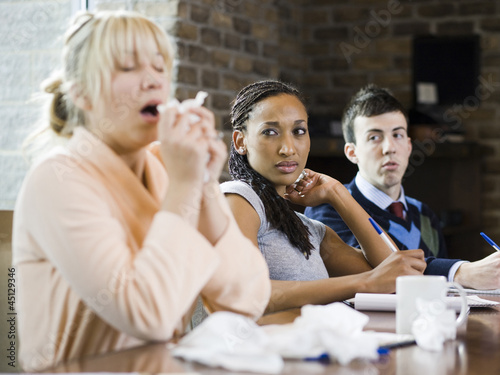 Photo: woman sick at work woman sick at work