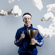 jogger holding a trophy