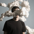 Foto: man standing in a cloud of smoke man standing in a cloud of smoke