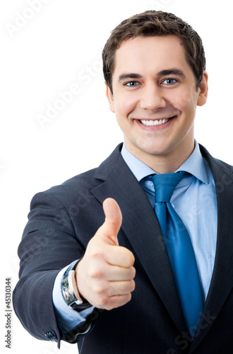 Photo: Businessman with thumbs up, isolated Businessman with thumbs up, isolated