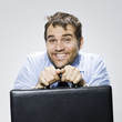 disheveled looking man with a briefcase