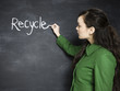 Photo : woman writing recycle on a chalkboard woman writing recycle on a chalkboard