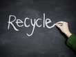 Photo : writing recycle on a chalkboard writing recycle on a chalkboard