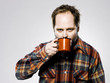 man drinking coffee