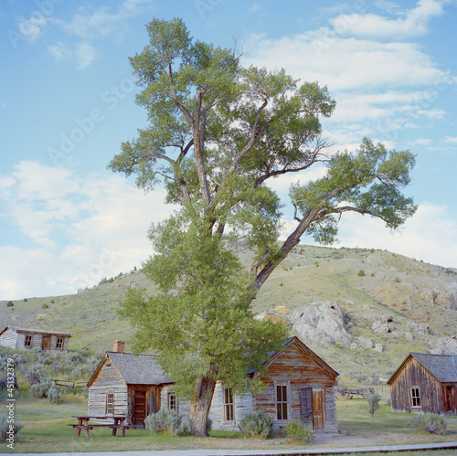 Photo: "USA, Montana, Bannack, Landscape with wooden houses" "USA, Montana, Bannack, Landscape with wooden houses"