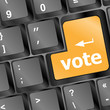 Computer keyboard with vote key, business concept