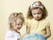 little girls with globe