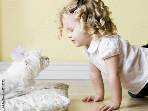 Photo: little girl with dog little girl with dog