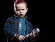 little boy singing into a microphone