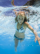 teenage girl in a swimming pool
