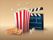 Popcorn and movie tickets with clapper board