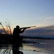 man duck hunting