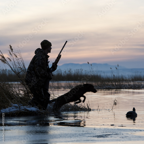 Photo: man and his dog duck hunting man and his dog duck hunting