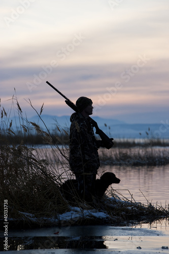 Photo: man and his dog duck hunting man and his dog duck hunting