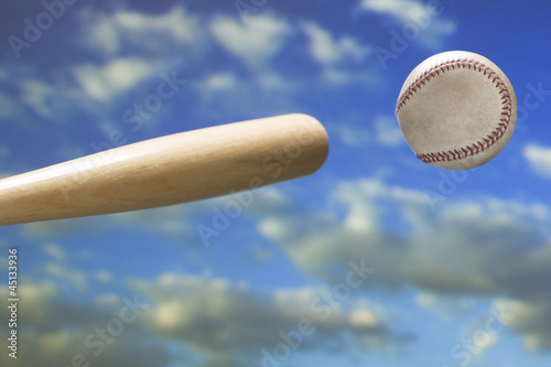Photo: bat hitting a baseball bat hitting a baseball