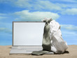 laptop in the sand